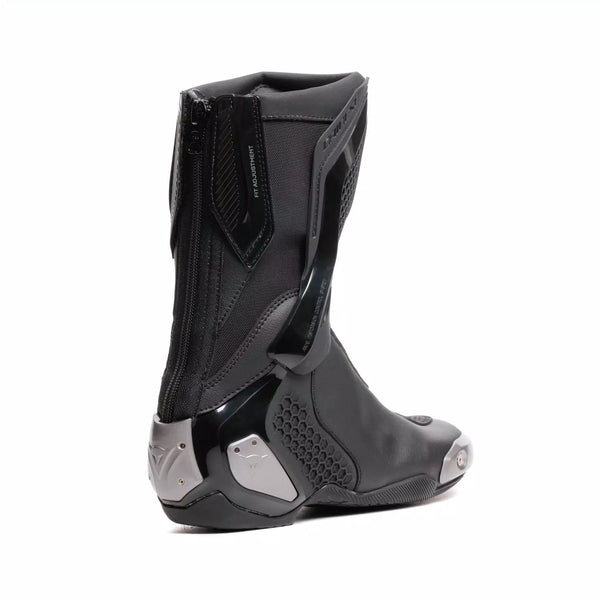 Dainese Torque 4 women's motorcycle boots in black, showing Groundtrax sole and magnesium sliders