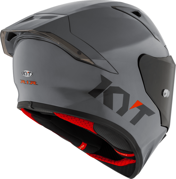 KYT R1R full-face racing helmet in plain grey, front three-quarter view