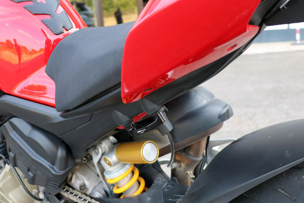 CNC Racing PET52 anodised aluminium pillion footpeg blanking plates for Ducati Panigale V4