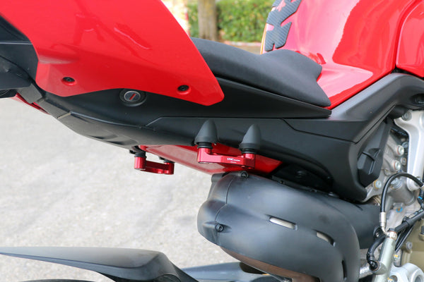 CNC Racing PET52 anodised aluminium pillion footpeg blanking plates for Ducati Panigale V4