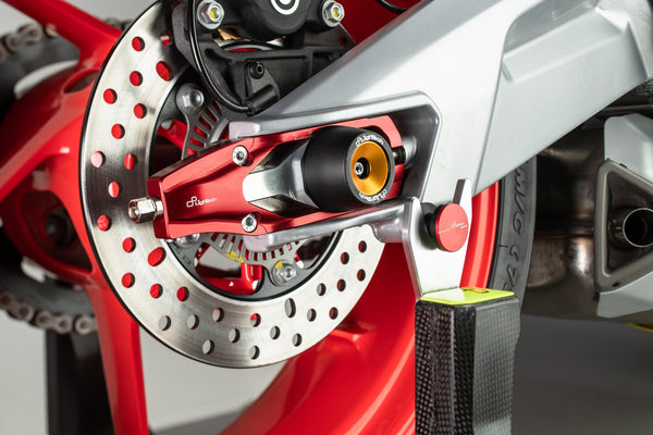 LighTech TEAP004 chain tensioner for Aprilia RS 660 in red and black Ergal 7075 aluminium
