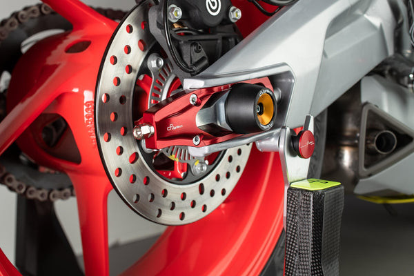 LighTech TEAP004 chain tensioner for Aprilia RS 660 in red and black Ergal 7075 aluminium