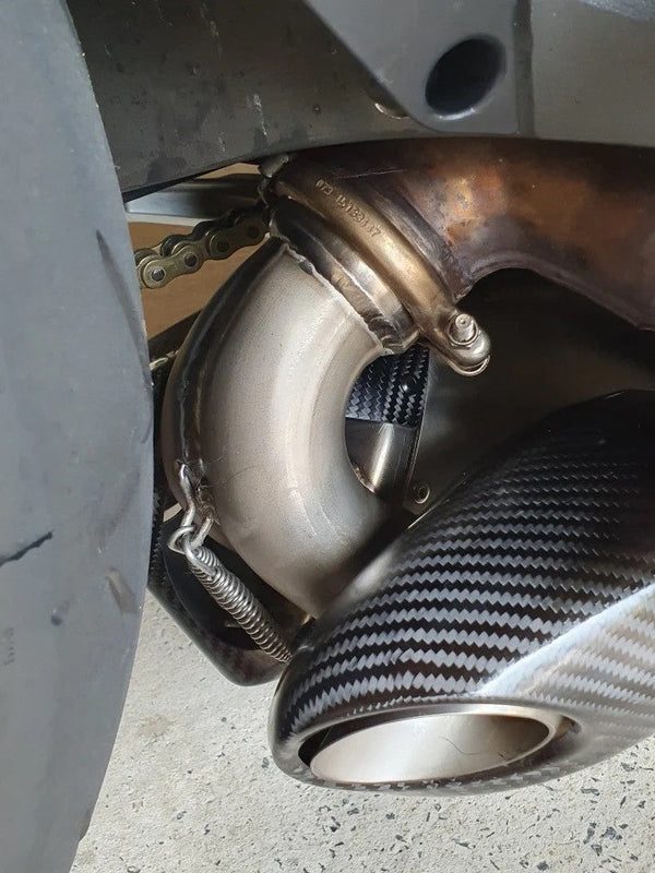 Vandemon Slip-On Low Titanium exhaust system on Ducati Panigale V2 955 with carbon fibre end caps