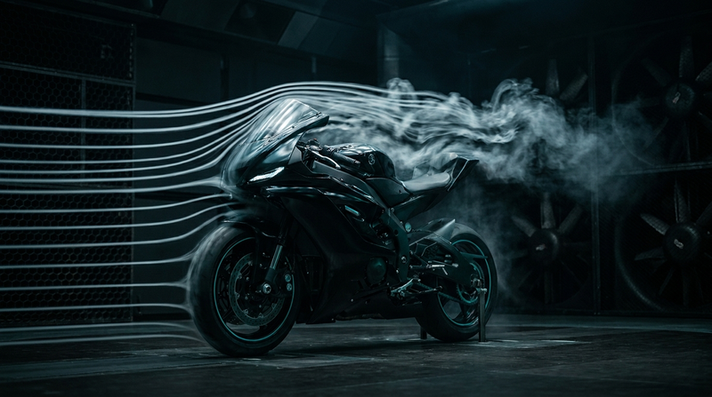 Sport motorcycle in a wind tunnel with airflow streamlines — the Puig aerodynamics story