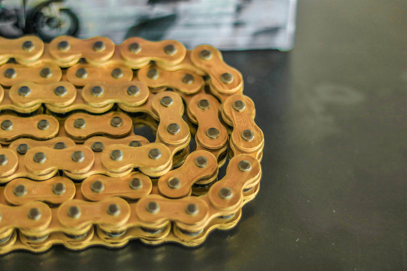 D.I.D 520ZVM-X X-ring chain 520 gold and grey open with rivet link