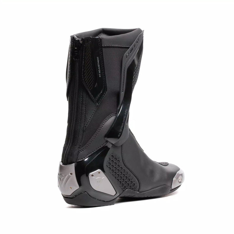 Dainese Torque 4 women's motorcycle boots in black, showing Groundtrax sole and magnesium sliders