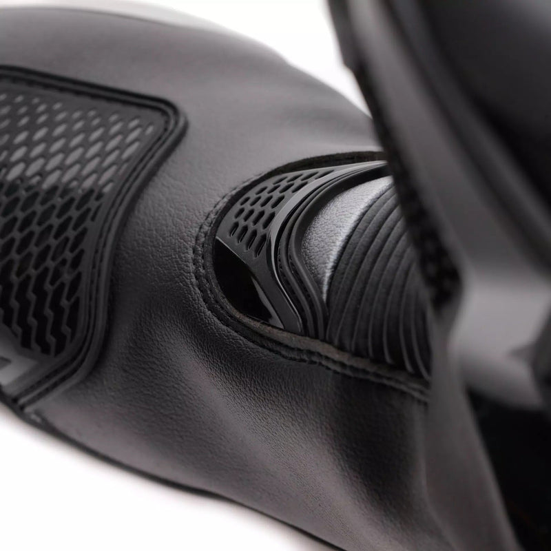 Dainese Torque 4 women's motorcycle boots in black, showing Groundtrax sole and magnesium sliders