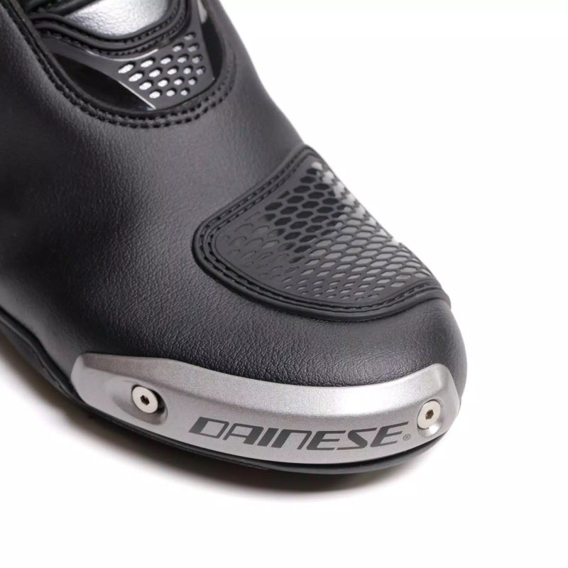 Dainese Torque 4 women's motorcycle boots in black, showing Groundtrax sole and magnesium sliders