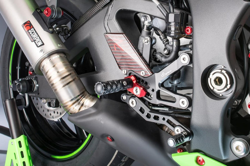 LighTech FTRKA006R R-series rearset kit for Kawasaki ZX-10R 2016–2020, red anodised carriers with carbon heel guards