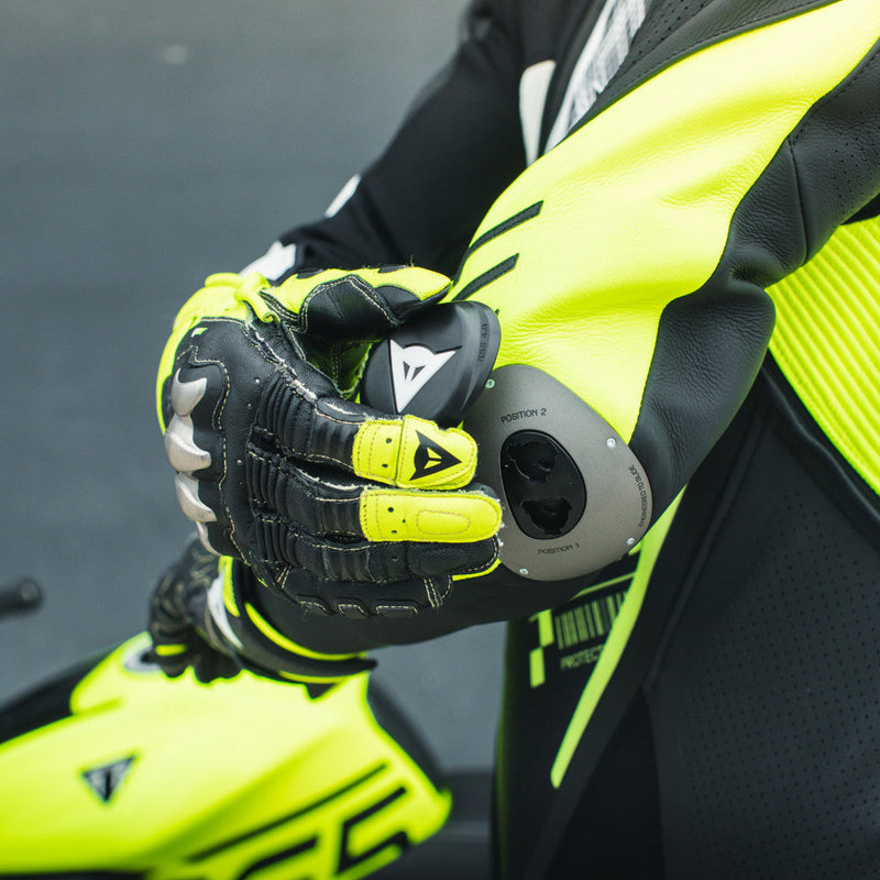 Dainese Audax D-ZIP one-piece leather racing suit in black and neon yellow