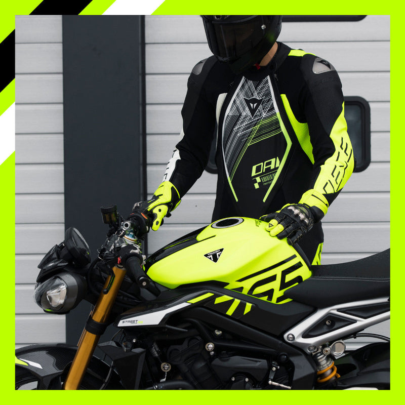Dainese Audax D-ZIP one-piece leather racing suit in black and neon yellow