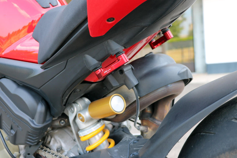CNC Racing PET52 anodised aluminium pillion footpeg blanking plates for Ducati Panigale V4