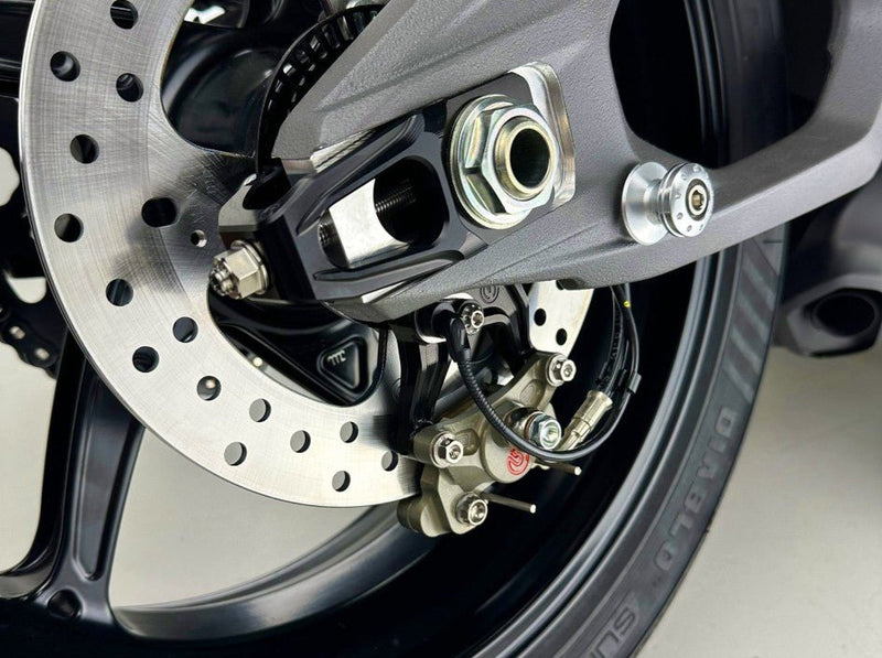 Motocorse chain tensioner slider kit with Brembo P2-24 caliper bracket for Ducati Panigale V4 2025-2026
