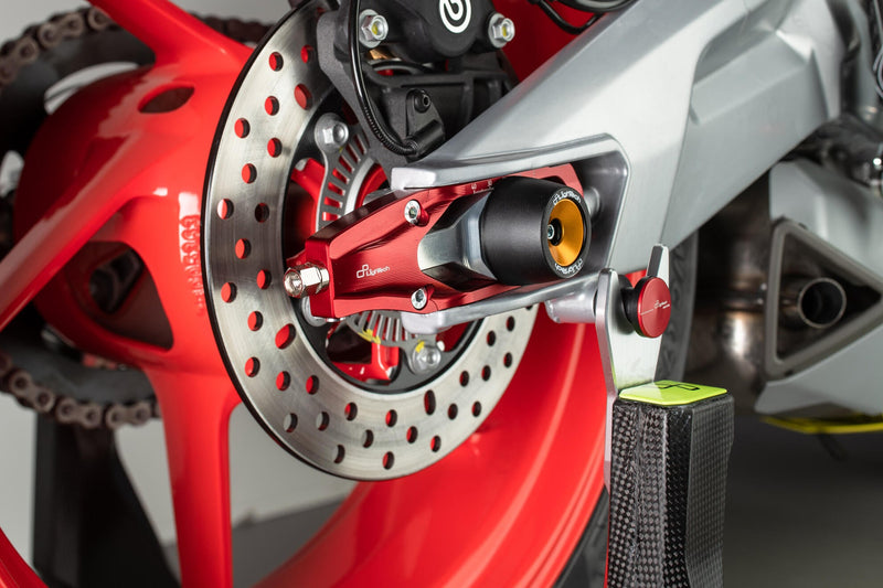 LighTech TEAP004 chain tensioner for Aprilia RS 660 in red and black Ergal 7075 aluminium