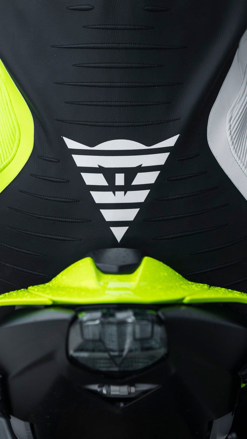 Dainese Audax D-ZIP one-piece leather racing suit in black and neon yellow