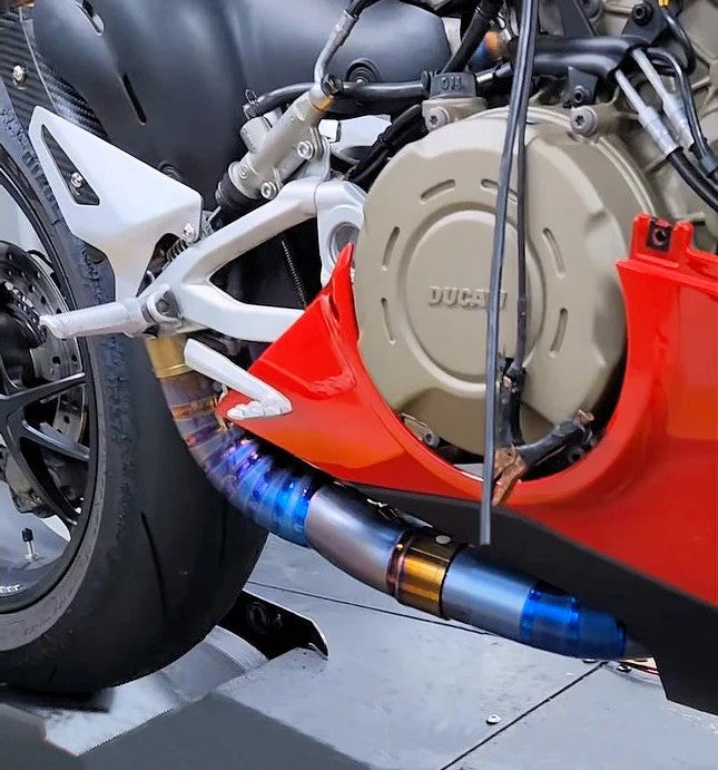 Vandemon Ti1 titanium half-system exhaust with carbon end caps on Ducati Panigale V4