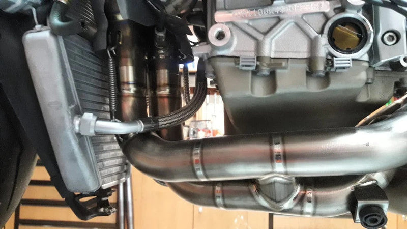 Vandemon Low Titanium full exhaust system on Ducati Panigale V4 natural brushed finish