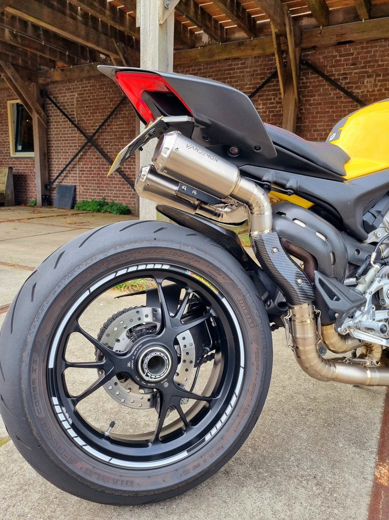 Vandemon Ti1 titanium half-system exhaust with carbon end caps on Ducati Panigale V4